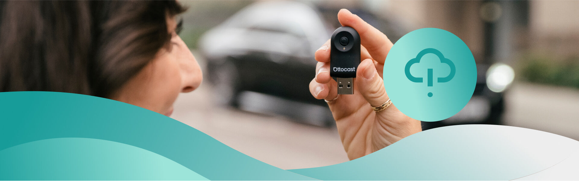 Woman holding Ottocast Mini wireless CarPlay and Android Auto adapter with compact USB design for seamless car connectivity